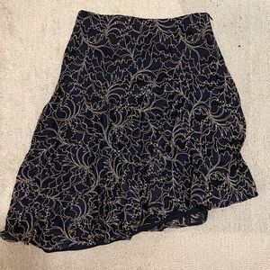 Zara Navy and Tan Floral Lace midi Skirt with an asymmetrical hem and flounce